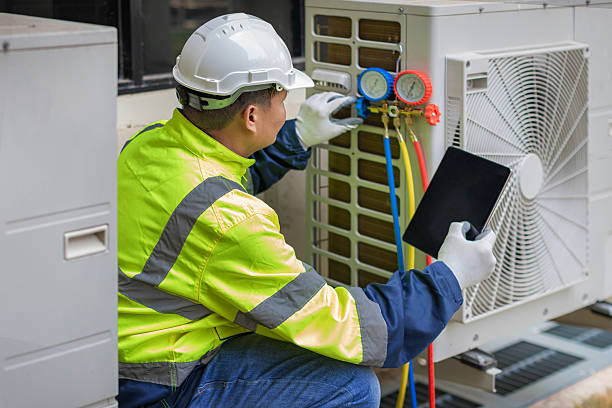 Professional Air Conditioning Repair technician working in Barberton, OH